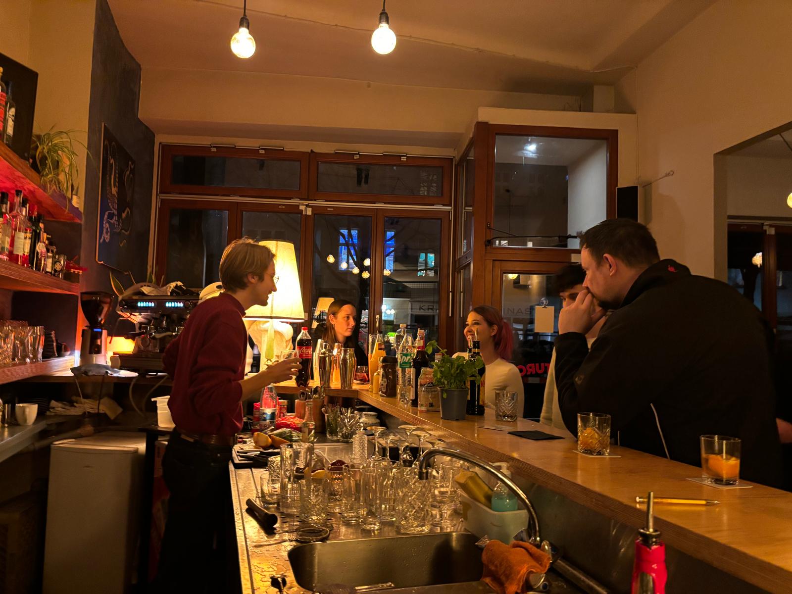 Friends sharing drinks together